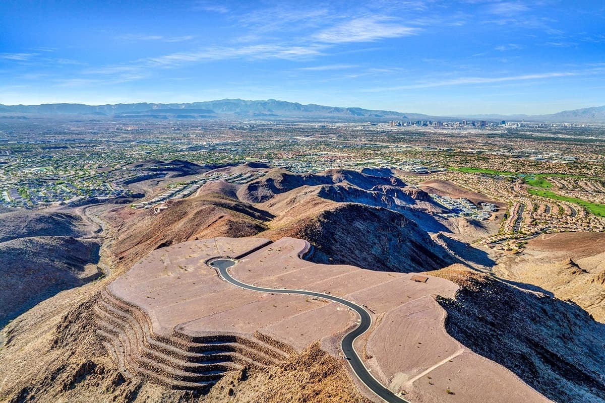 Aerial view of Ascaya Cloud Rock homesites with panoramic Las Vegas Strip and mountain views.