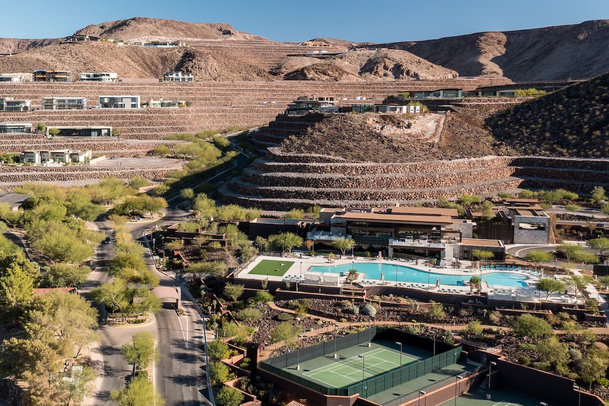 Luxury hillside community with pools and desert landscaping in Las Vegas.