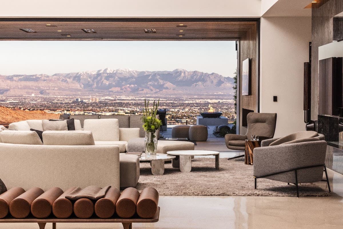 A modern, open-concept living space designed to blend indoor and outdoor living.