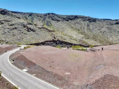 Aerial view of homesite lot outlined within a desert mountainside community development