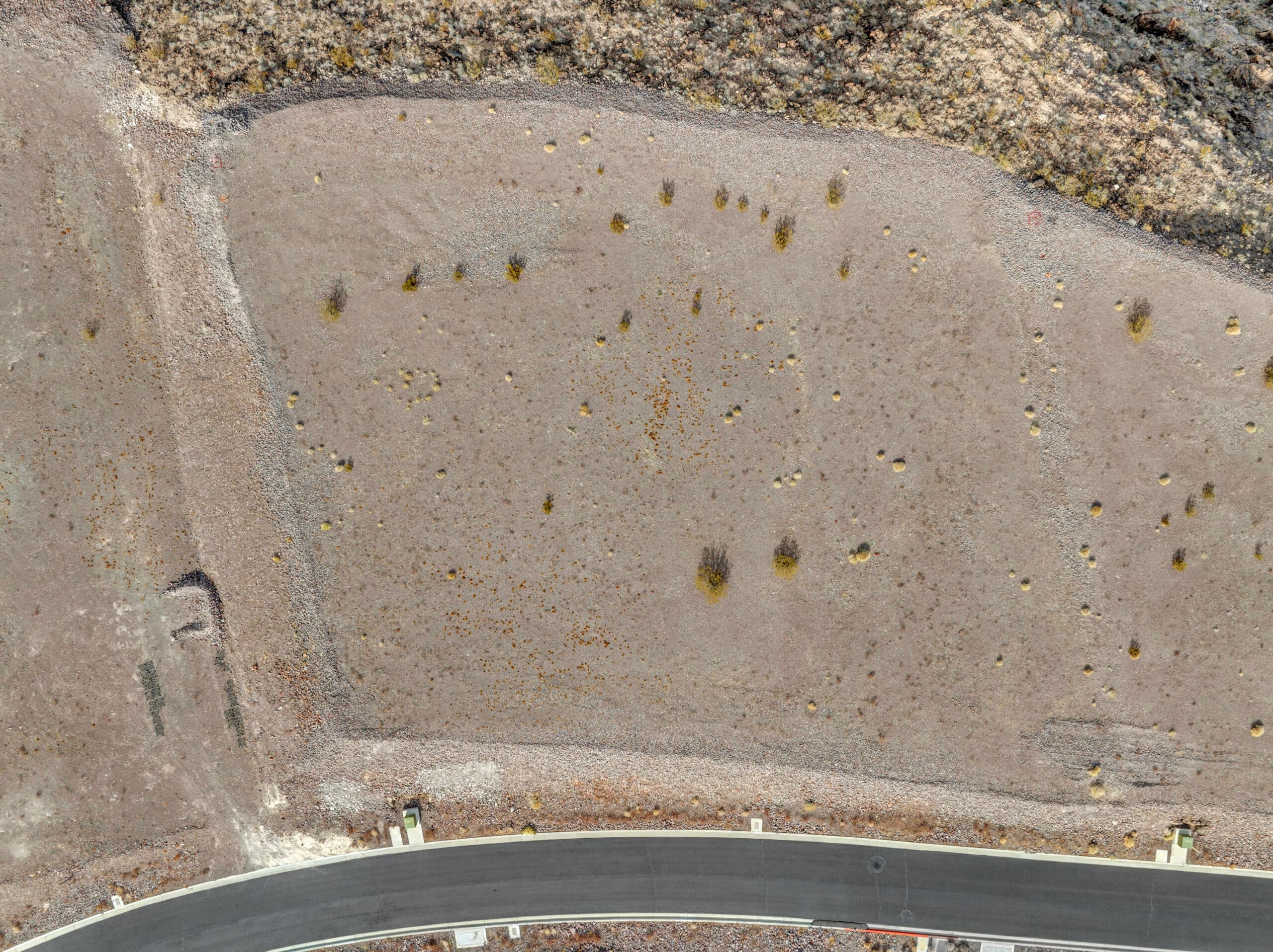 Aerial view of premium desert homesite on cul-de-sac in luxury Las Vegas hillside community.