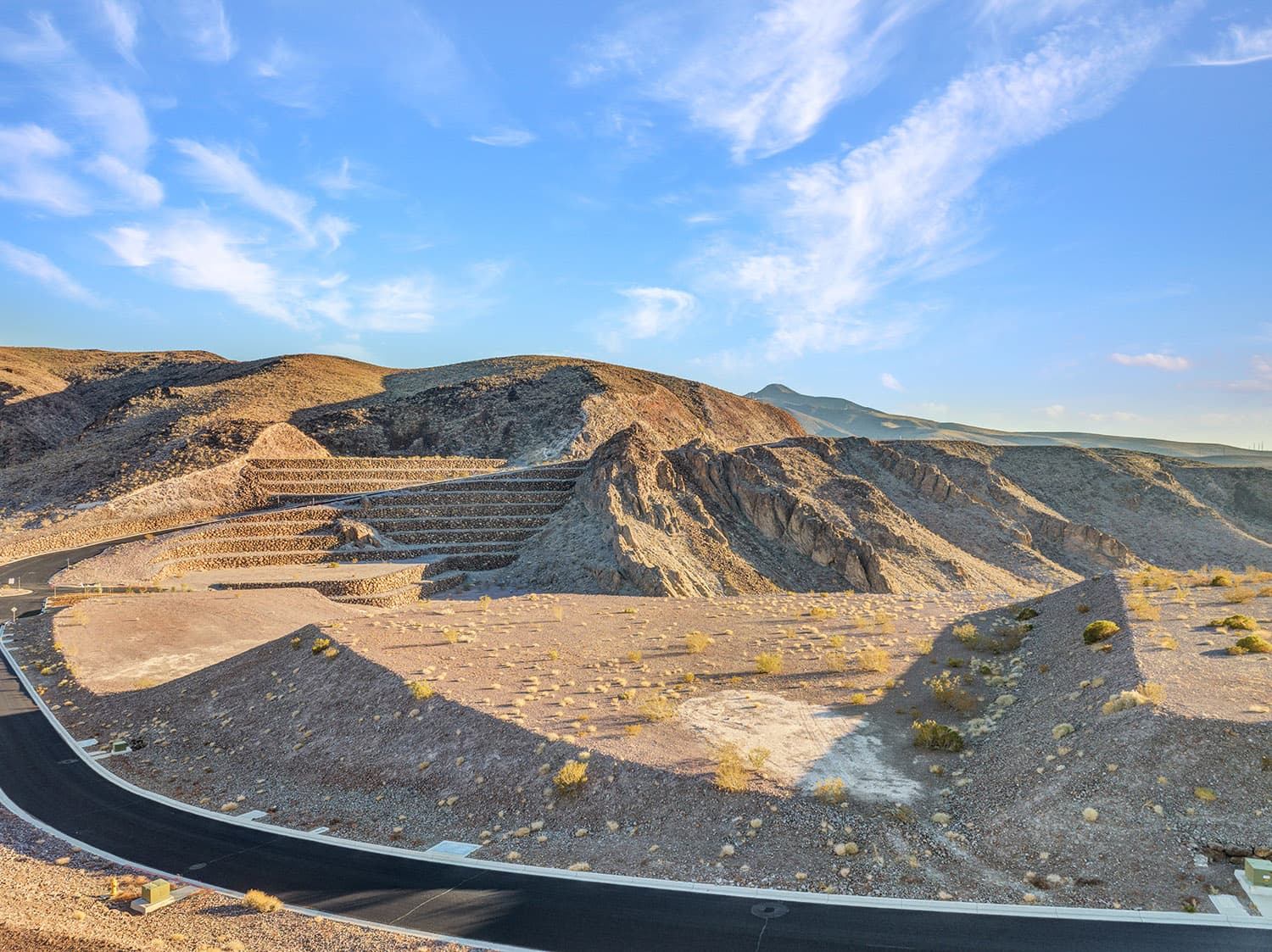 Luxury homesite in Ascaya with dramatic canyon views, terraced desert terrain, and elevated mountain landscape in Henderson, Nevada
